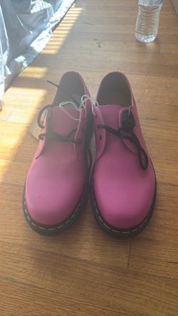 Pink Dr . Martens