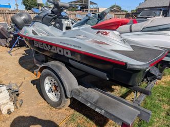 2000 seadoo & 1999 Polaris Genesis with trailer