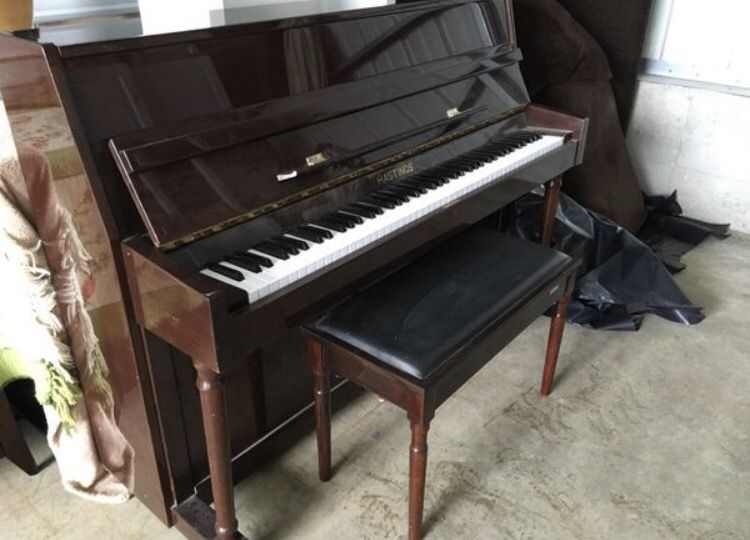 Hastings upright piano with bench
