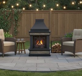 Delivery Available! Sunjoy Black Outdoor Direct vent Wood-Burning Fireplace! Good condition! Has some rust through on front bottom. But sturdy! Has be