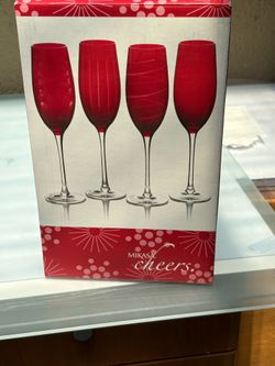 Flute & champagne 8 oz. Red color glasses of 4 set by Lifetime Brand Inc. originally bought for $84. Brand new still in box. Great for daily, occasion