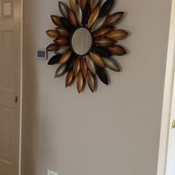 Multi Colored Metal Sun Mirror $10