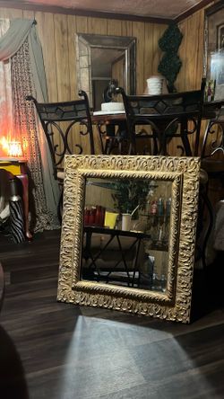 Golden vantage mirror . 24x36