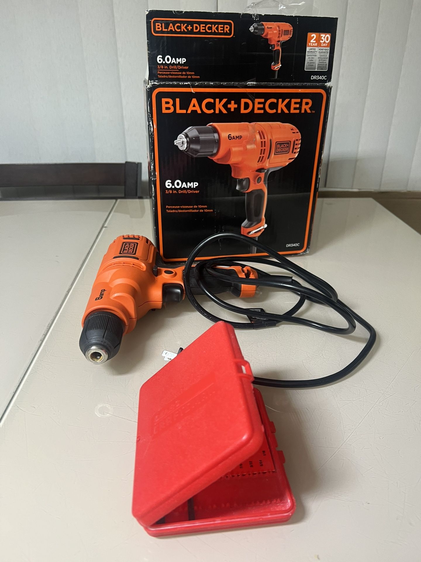 Black & Decker DR340C 6.0 Amp 3/8" Wired Drill Driver barely used in excellent condition with box and extra bits. Lot#of.12AUG3031 Bin900