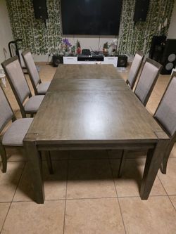 Large dining table with 6 chairs