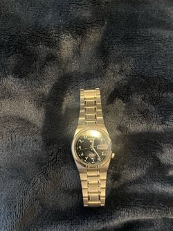 Seiko Black dial silver band watch