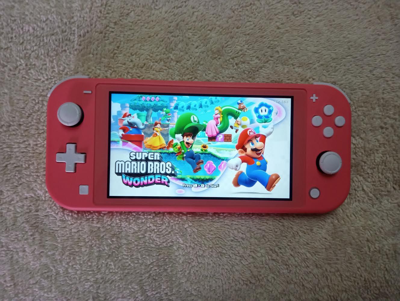 NINTENDO SWITCH LITE MOD with 120 POPULAR SWITCH GAMES and 7500 CLASSIC ARCADE GAMES