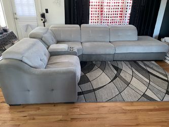 Sofa Sectional and loveseat with auto-recliner.