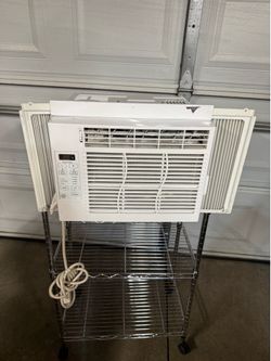 G.E. , 6,000 BTUS AIR CONDITIONER. $100.00