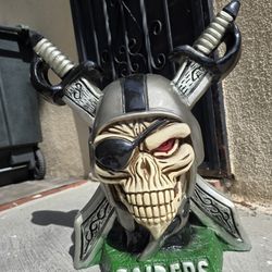 Raiders Statue Coin and Bill Bank