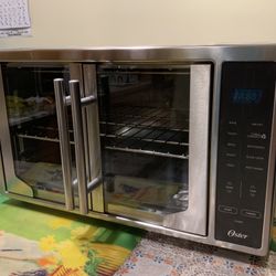 Oster Air Fryer Oven 10-in-1 Countertop Toaster Oven XL Capacity & French Doors, Stainless Steel