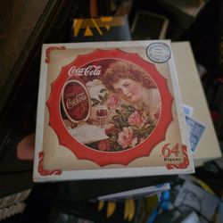 Vintage 1999 Coca-Cola 64-piece mini jigsaw puzzle in the shape of a bottle cap