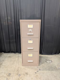 Tan Metal Three-Drawer Filing Cabinet with missing key