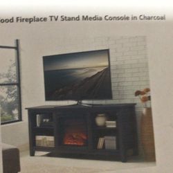58’’ FIREPLACE TV STAND WITH 4 SHELVINGS. 58 X 25H X 16. IN GREAT CONDITION
