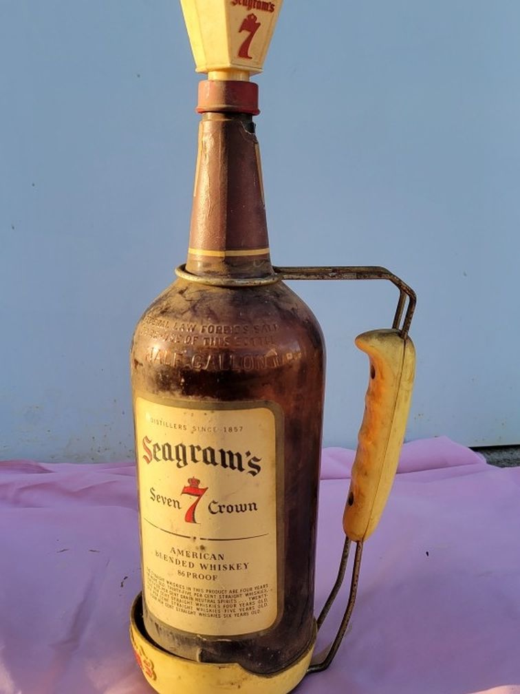 Seagrams 7 antique bottle with handle pourer.