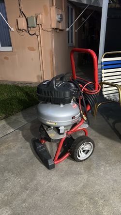 Air compressor on wheeled cart. 3.0 cfm