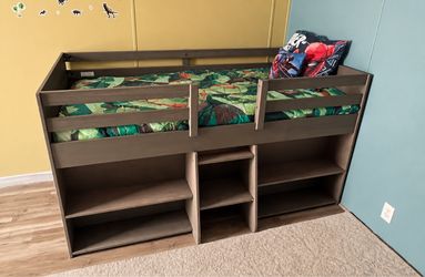 Loft bed with cubby and bookshelves