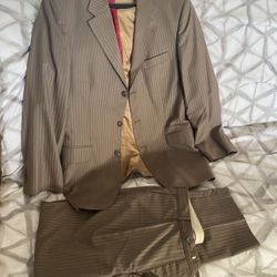 full suit (pants and jacket) X large size. Fits most adults 