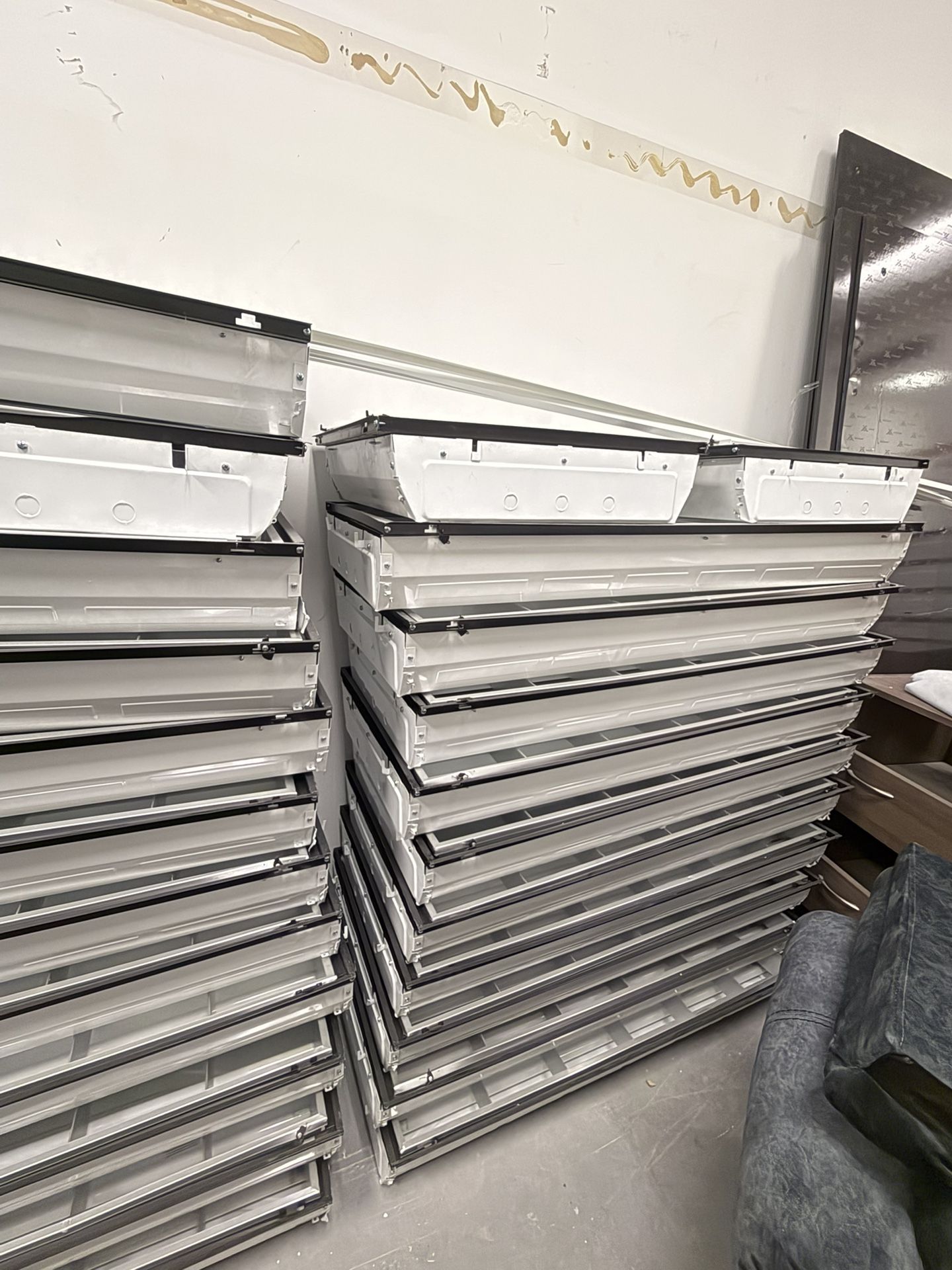 Stack of Metal Drawer Frames – Ready for Assembly