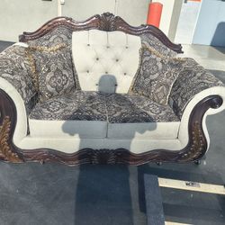 Antique Wooden Carved Sofa And Loveseat With Two Antique And Carved Chairs.
