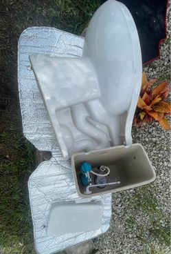 White Toilet with Tank and Seat
