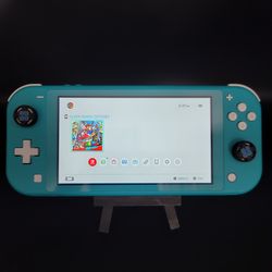 Nintendo Switch Lite Turquoise ( Tested & Working  ) Setting Re-Set ( Game NOT Included  )