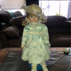 Vintage ceramic Doll with markings on the back very beautiful