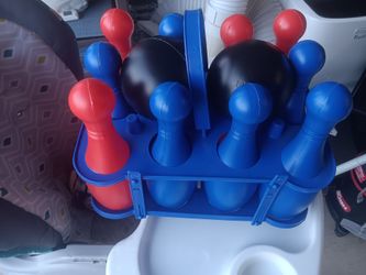 BRAND NEW CHILDREN'S BOWLING PINS AND BALL FOR SALE