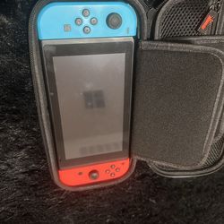 Nintendo Switch 1 with travel case