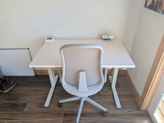 Herman miller powered sit to stand computer desk and chair