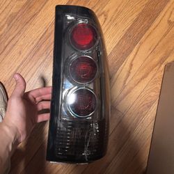 Headlights & Taillights 2003 GMC Sierra 