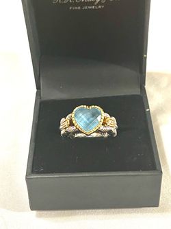 Brand new 18 karat gold & .925 silver ring with 4 diamonds & heart shaped aquamarine. Size 7.