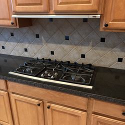 Ge profile gas stove and over the range fan