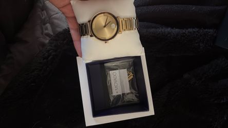 Movado Gold watch with diamond