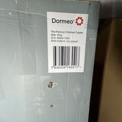 New in the box Dormeo Mattress Topper. Size King 3 in. Retailing at $369, save huge.