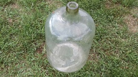 Antique glass water cooler bottle