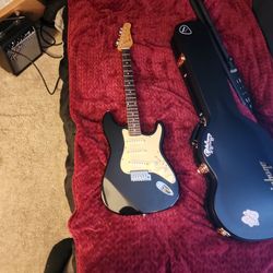 Guitar - Stratocaster Style Rok Axe Beginner Guitar.