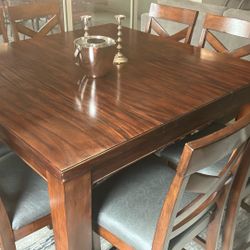Bar Height Table With Eight Chairs