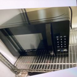 Medium Size Microwave Like New In The Box Asking $60. Obo Today 