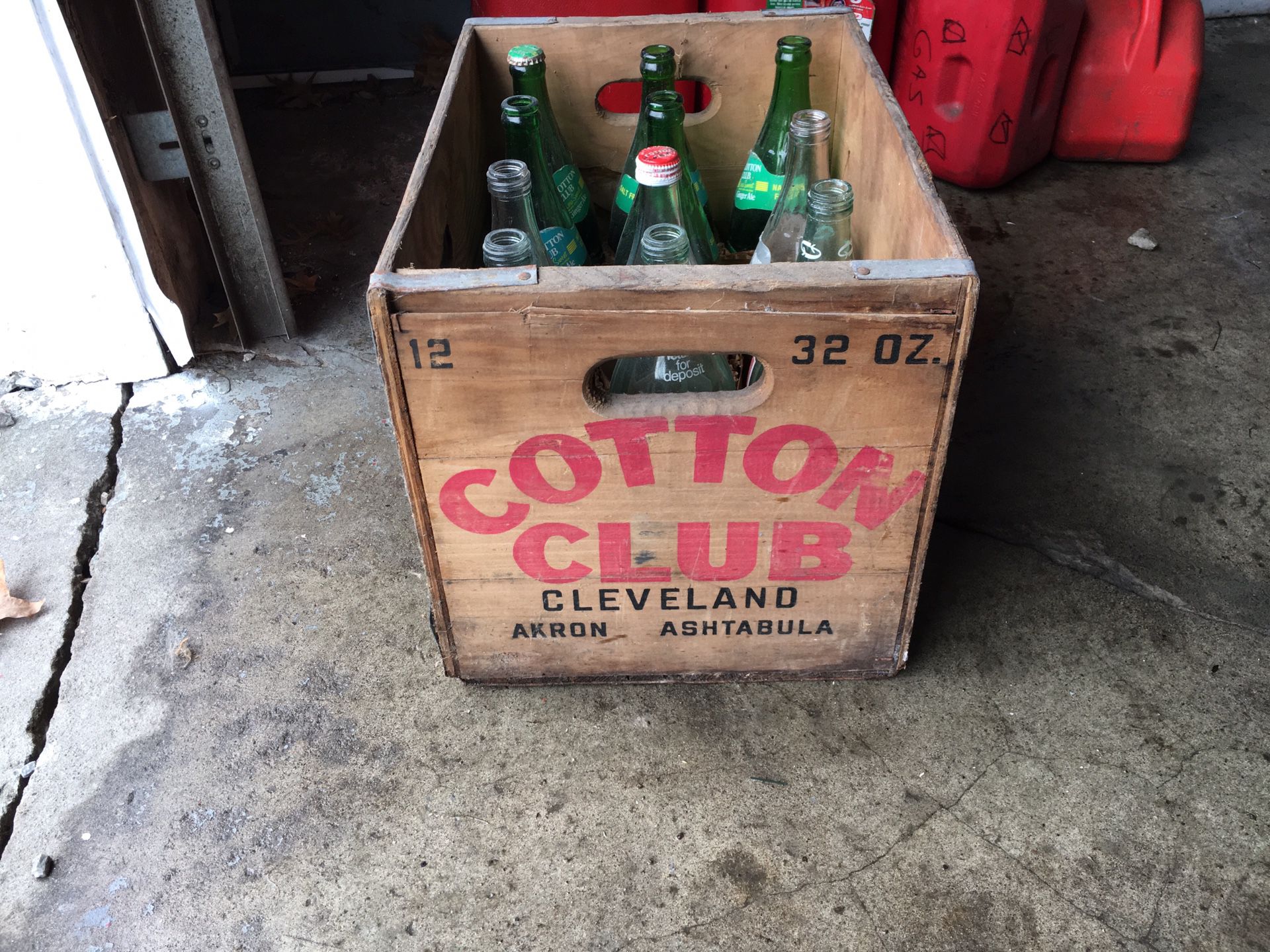 Antique cotton club case with bottles