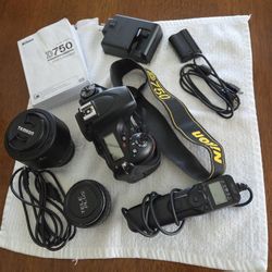 Excellent condition Nikon D 750 camera body (Lens optional) with multiple accessories .