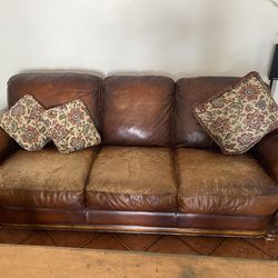 Leather sofas, and easy chair with ottoman
