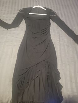 Size small black midlength dress with long mesh sleeves and cute open front near the legs