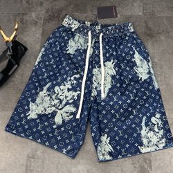 Louis Vuitton's new heavy-duty rendering full-print distressed denim shorts