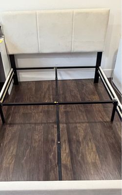 Beige full size bed frame