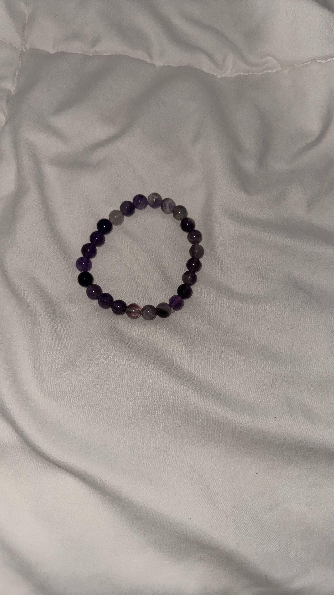 Purple protection, glass beads