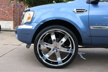 Chrysler SUV Blue with Chrome Wheels