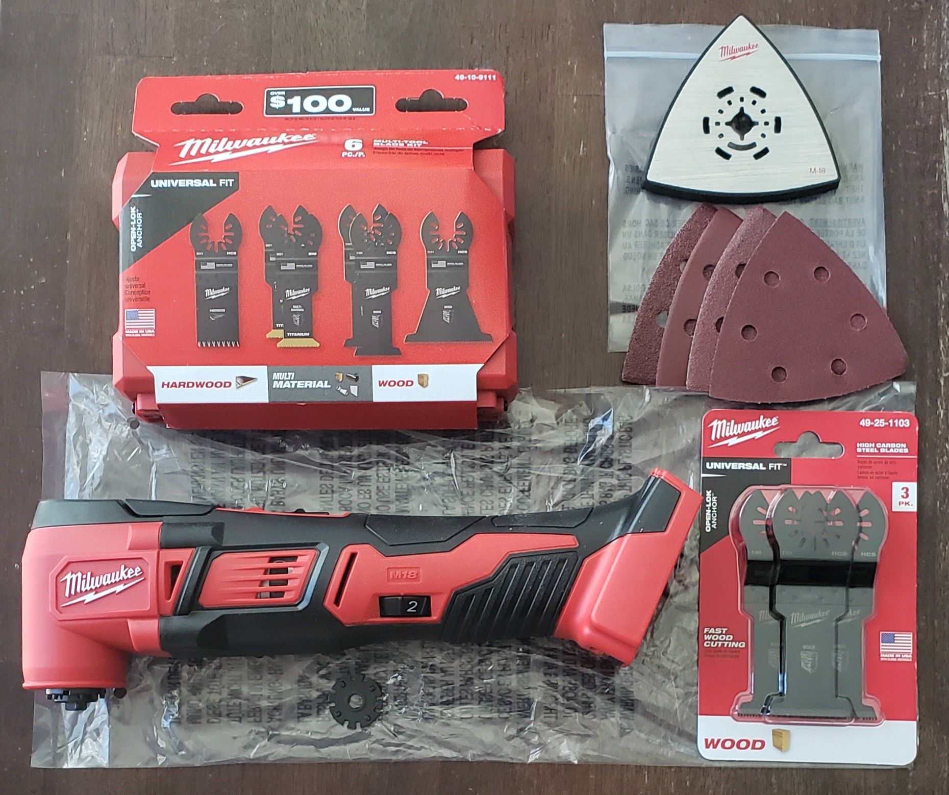 Milwaukee M18 Oscillating Multi Tool with 9 Assorted Blades and Sanding Accessories (Brand New)