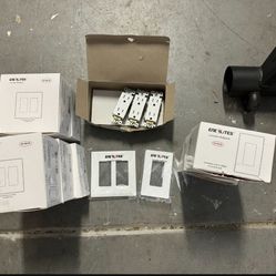 ~40 Double Light Switch Plates, ~22 Single Light Switch Plates, 3 Outlet Plugs