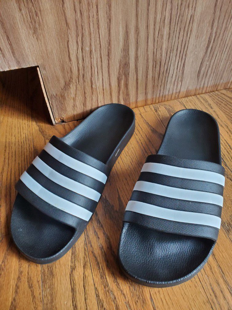 NEW Adidas Slides. Mens size 10/Womens size 11